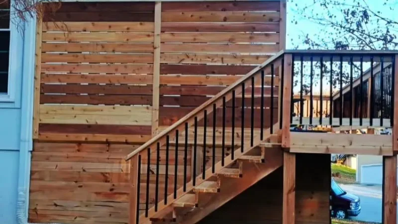 wooden privacy screen and staircase on a residential deck in kansas city